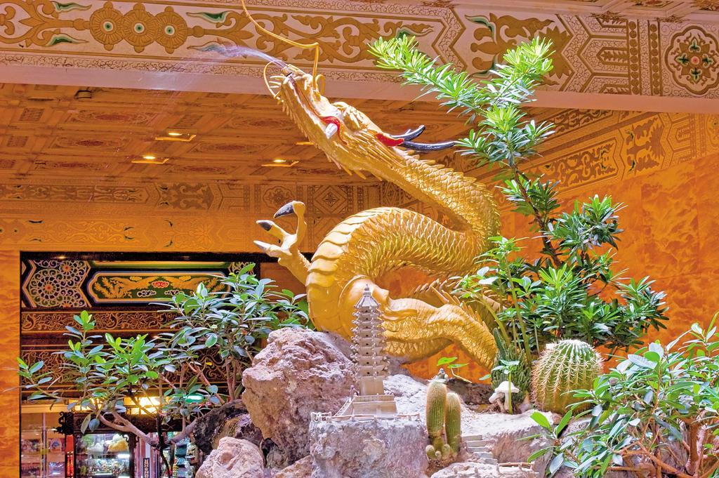 The Grand Hotel Taipei Exterior photo The golden dragon at the entrance of the temple